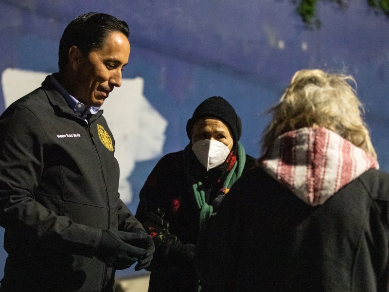 Mayor Todd Gloria and Councilwoman Jen Campbell talk toElvida Elizalde, a homeless resident in the Ocean Beach area, while conductiing the Point-in-Time Count that surveys homeless individuals throughout the San Diego region on Feb. 24, 2022. / Photo by Adriana Heldiz