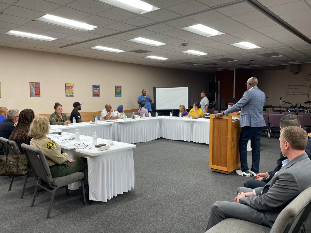San Diego Police officials discuss CalGang with members of the city's Commission on Gang Prevention and Intervention. / Photo by Kelly Davis